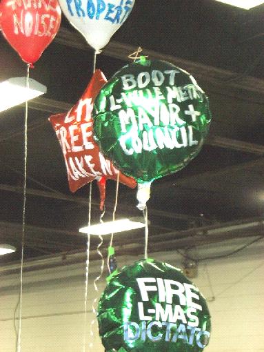 helium baloons used at dog show in Louisville Kentucky saying Boycott Louisville BOYCOTT HSUS repeal bad pet law, pets are private property repeal smoking ban boot Louisville mayor and council fire Louisville Metro Animal Services director gilles meloche