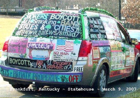 picture of 3/4 rear view of smokers rights/liberty van wording says SMOKERS BOYCOTT ALL SMOKING BAN STATES AND CITIES if you love freedom join us, boycott the United People's Republics of America Pets are PRIVATE PROPERTY paws OFFNO NAIS National Animal Identification System